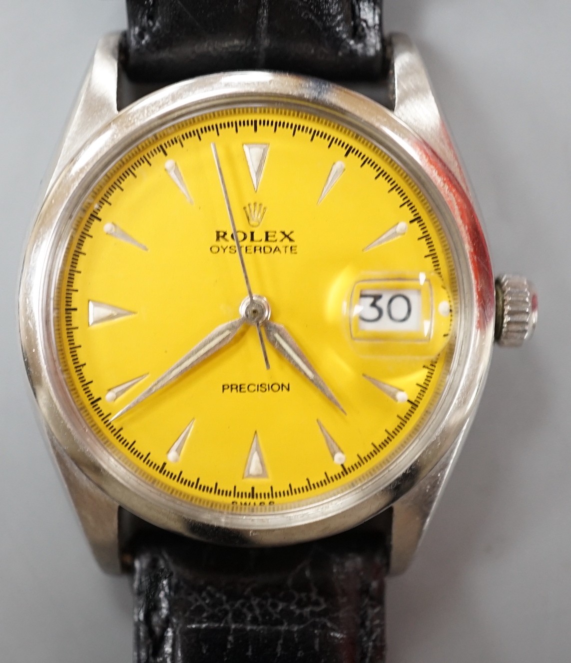 A gentleman's stainless steel Rolex Oysterdate Precision manual wind wrist watch, with later? custom yellow dial, model no. 6294, serial number 959653, on later associated leather strap, case diameter 34mm, no box or pap